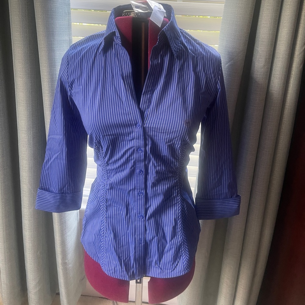 New with tags. Size Medium. Form fitting, Striped button down shirt.